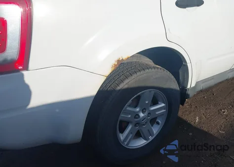 2010 Ford Escape Hybrid Limited from USA, damaged, VIN 1FMCU5K39AKA47079